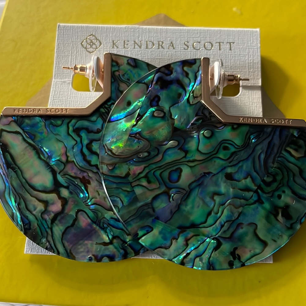 Kendra Scott abalone earrings.